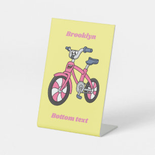 Cute roze kinder fietsenafbeelding cartoon reclamebord met voetstuk