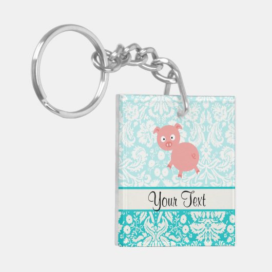 Cute roze pig; Blauwgroen schade Sleutelhanger (Voorkant Links)