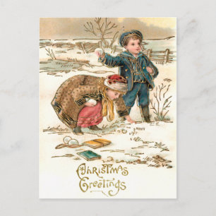 Cute Schoolchildren die op sneeuw spelen Briefkaart