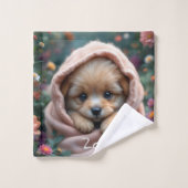 Cute, tiny, fluffy puppy surrounded by flowers (Gant de toilette)
