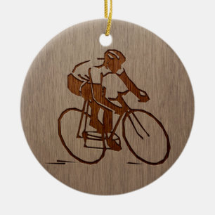 Cyclisch silhouet gegraveerd op houtafbeelding keramisch ornament