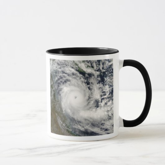 Cyclone Ingrid Mok (Rechts)