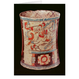 Cylindrique dépeignant une divinité avec des