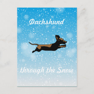 Dachshund door de sneeuw briefkaart