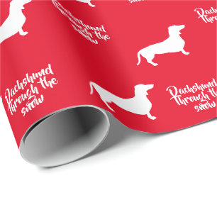 Dachshund door de sneeuw cadeaupapier