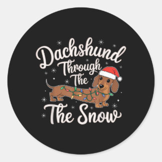 Dachshund door de sneeuw Kerstdecoratie voor honde Ronde Sticker