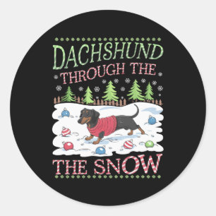 Dachshund door de sneeuw ronde sticker