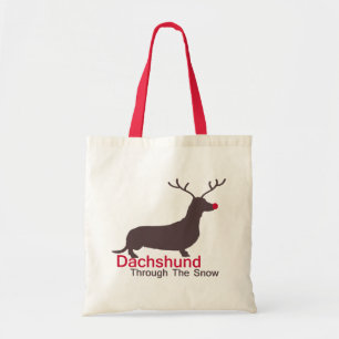 Dachshund door de sneeuw tote bag