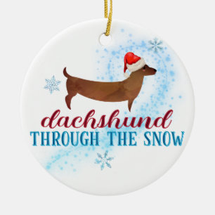 Dachshund door de sneeuwkerstman keramisch ornament