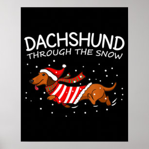 Dachshund door de sneeuwnende hond kerstmis poster