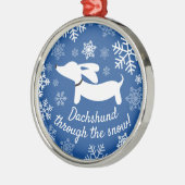 Dachshund door het Ornament van de sneeuwkerstboom (Links)