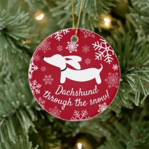 Dachshund door het Ornament van de sneeuwkerstboom