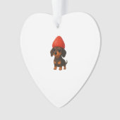 Dachshund drôle avec des fraises et un chapeau fru (devant)