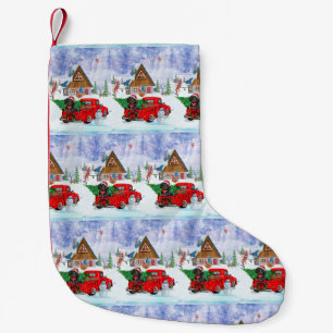 Dachshund hond in Kerstbezorgtruck Sneeuw Kleine Kerstsok