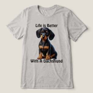 Dachshund Puppy Zit en Kijkt met Onschuldige Tri-Blend Shirt