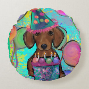 Dachshund rond kussen