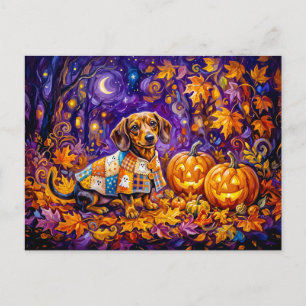 Dachshund zit tussen pompoenen onder herfstnacht briefkaart