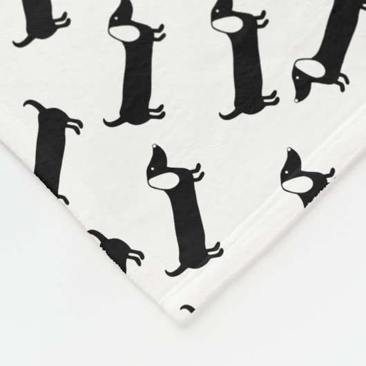 Dachshunds in zwart-wit fleece deken (Hoek)