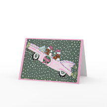 Dachshunds met Kerstmis in een roze cabriolet