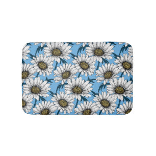 Daisies, wilde bloemen op blauw badmat