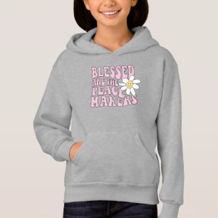 Daisy et les artisans de la paix Slogan