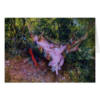 Dame dans un hamac en robe rose