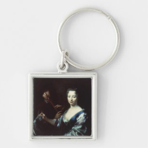 Dame die een knuffel en een flutist speelt sleutelhanger