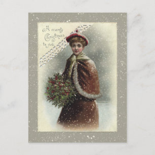 dame in sneeuw met kerstcadeautje feestdagenkaart