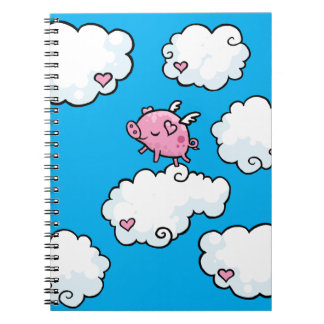 Dans van vliegende varkens op het spiraalboek van  notitieboek