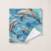 Dauphins nageant dans la mer (Gant de toilette)