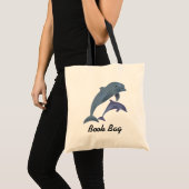Dauphins tropicaux sautant sac de livre (Devant (produit))