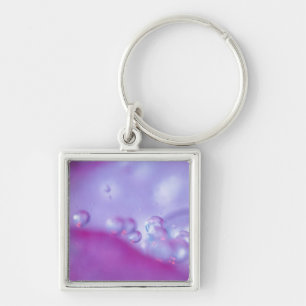 Dauw druppels op bloemblad abstract. sleutelhanger