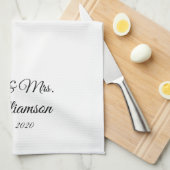 De achternaam, het jaar, het nummer van de koppeli theedoek (Quarter Fold)