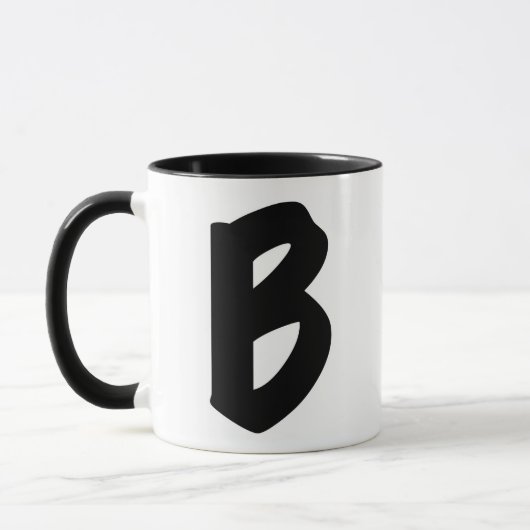 De "B" mok (Links)