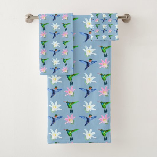 De beaux colibris et fleurs sur fond bleu clair (En situation)