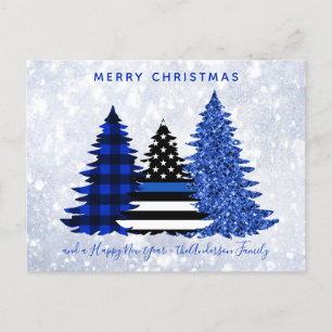 De blauwe lijn van de politie met kerstmis in de b feestdagenkaart