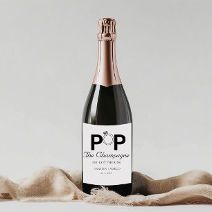 De champagne knalt, ze heeft de ring, verlovingsfe sparkling wijnetiket