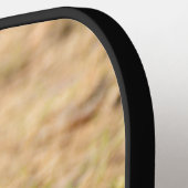 De eekhoorn eet een moerfoto pickleball paddle (Links Detail)