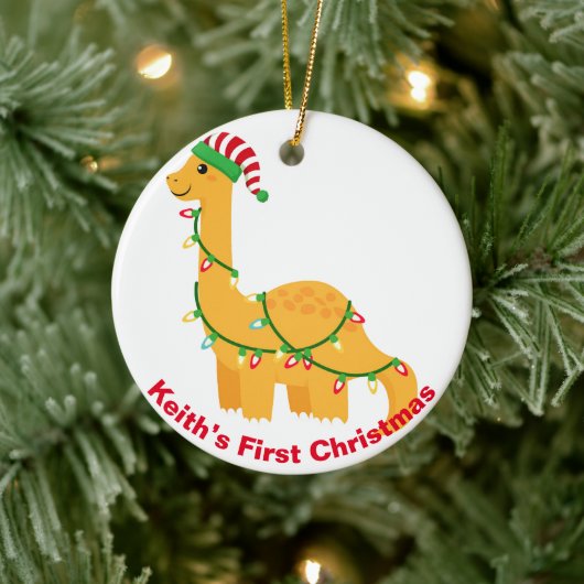 De eerste kerstdinosaurus van baby.  keramisch ornament (Boom)