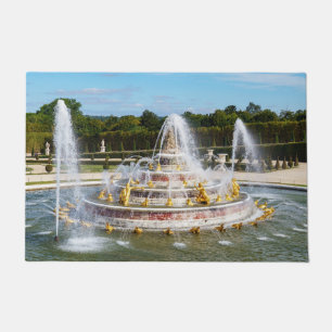 De fontein Latona in de tuinen van Versailles Deurmat
