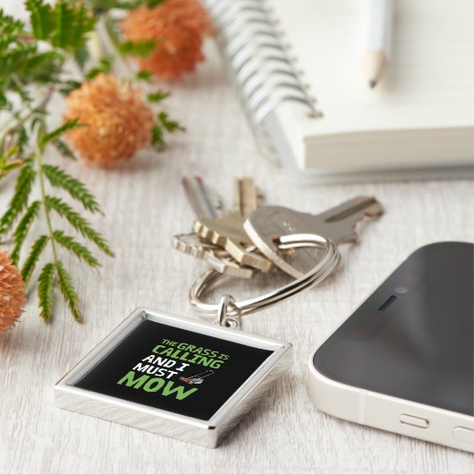 De gras roept en ik moet maaien sleutelhanger (Zijkant)