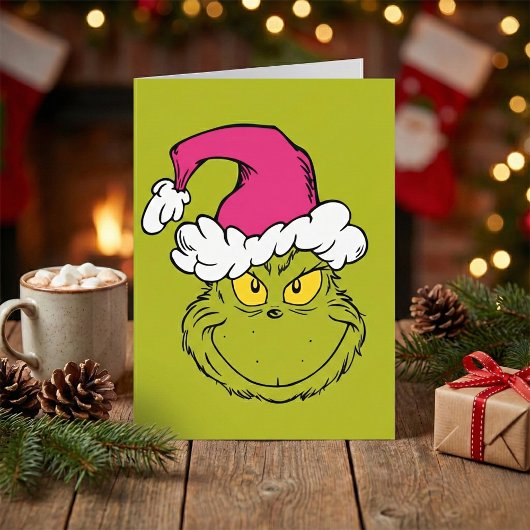 De Grinch in een roze kerstmannenhoed Kaart