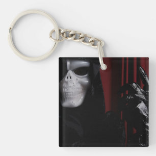 De handschoen- sleutelhanger