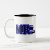 de heer Mister Mok (Links)