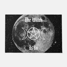 De heks zit in deurmat