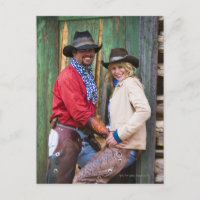 De holding van de cowboy en van de veedrijfster