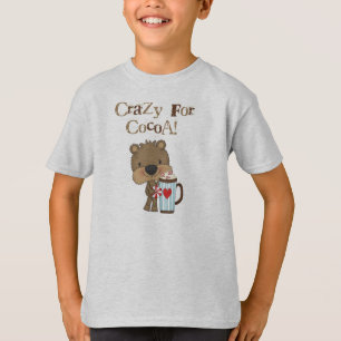 De jongen draagt Gek voor de Vakantie van de Cacao T-shirt