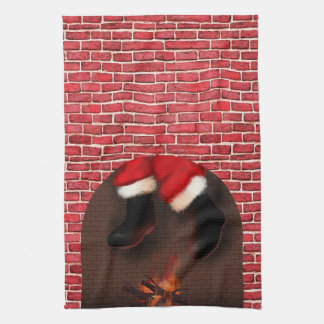 De kerstman in de schoorsteen theedoek