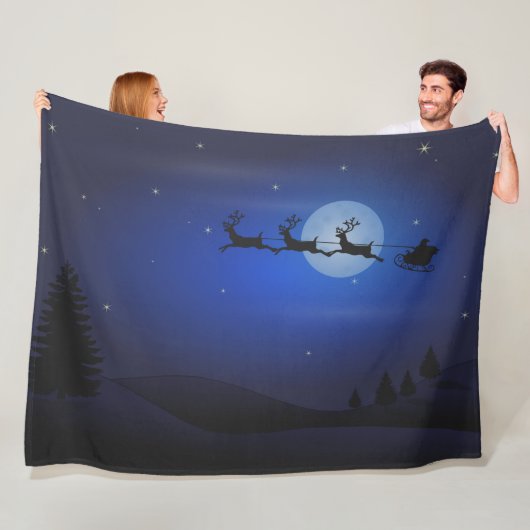 DE KERSTMAN IS ONDERWEG FLEECE DEKEN (In situ)