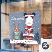 De kerstman komt eraan raamsticker (Cafe Raam)